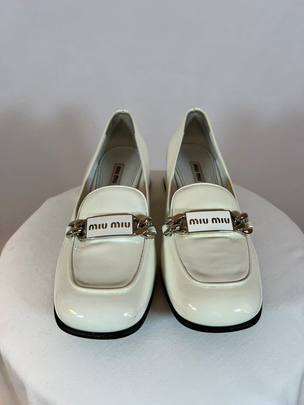 Mocassins en cuir à talonnettes blancs