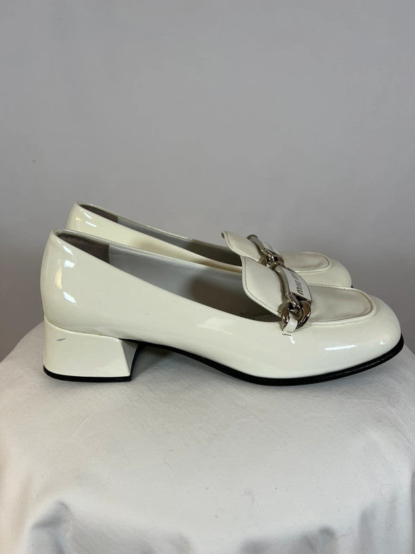 Mocassins en cuir à talonnettes blancs