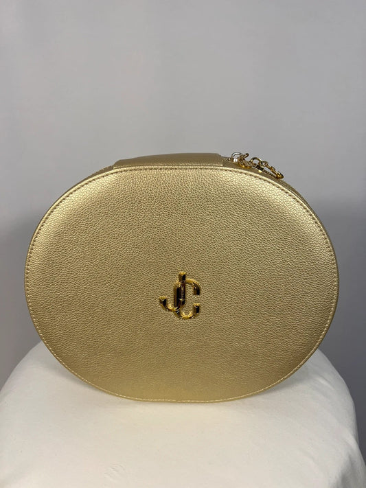 Coffret doré avec parfums et gloss