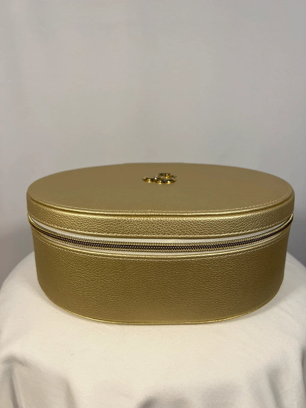 Coffret doré avec parfums et gloss