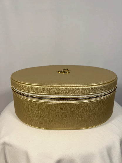 Coffret doré avec parfums et gloss