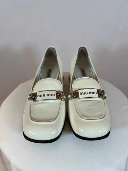 Mocassins en cuir à talonnettes blancs