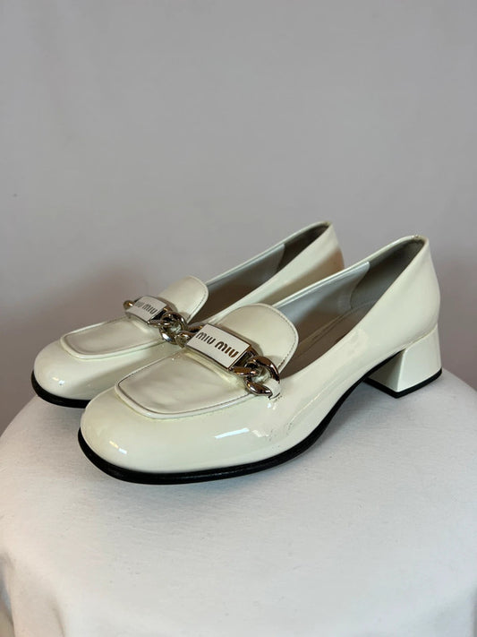 Mocassins en cuir à talonnettes blancs