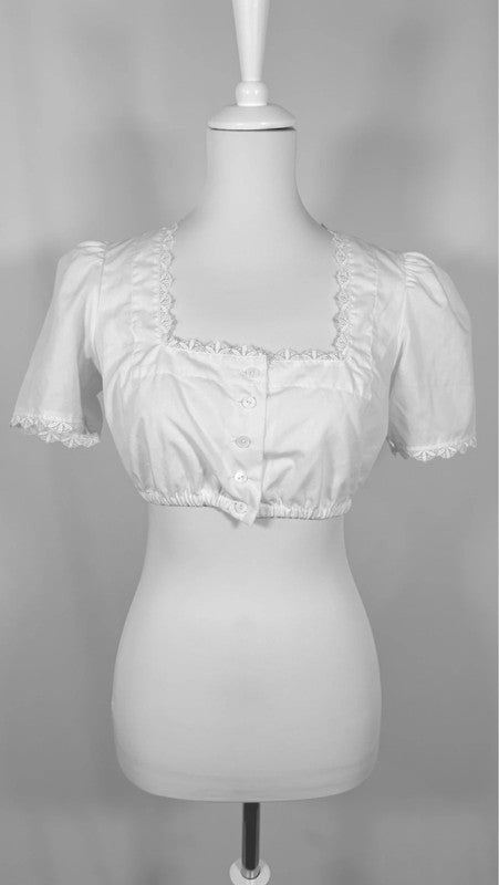 Blouse blanche courte à manches bouffantes