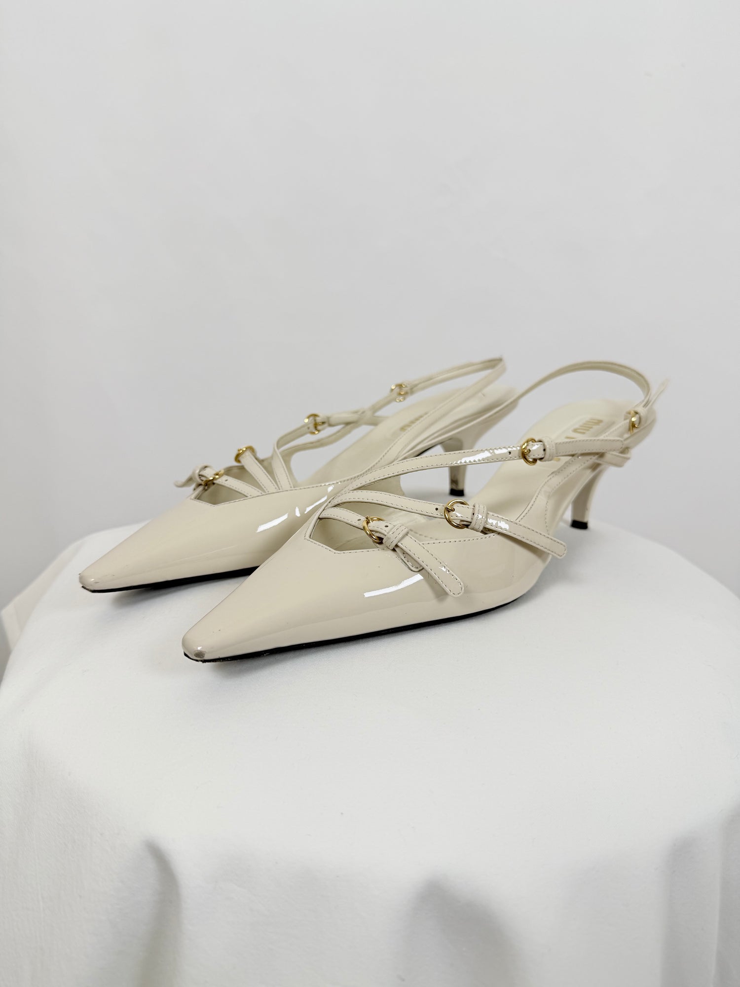 Slingback pointed-toe pumps