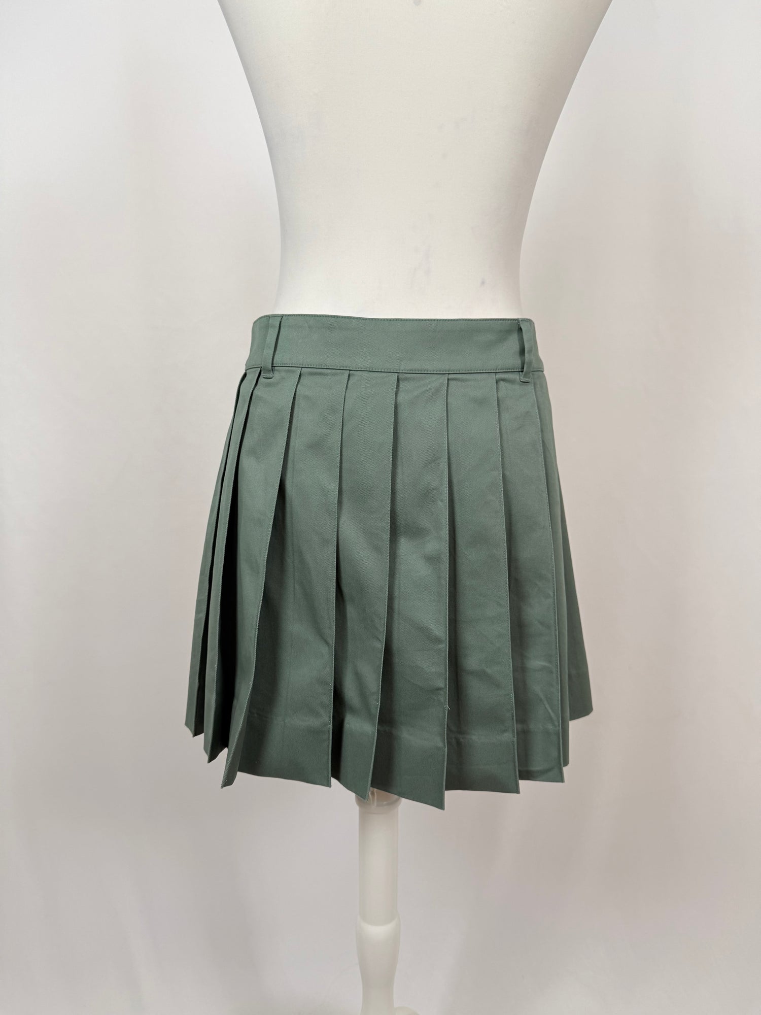 Mini jupe plissée verte