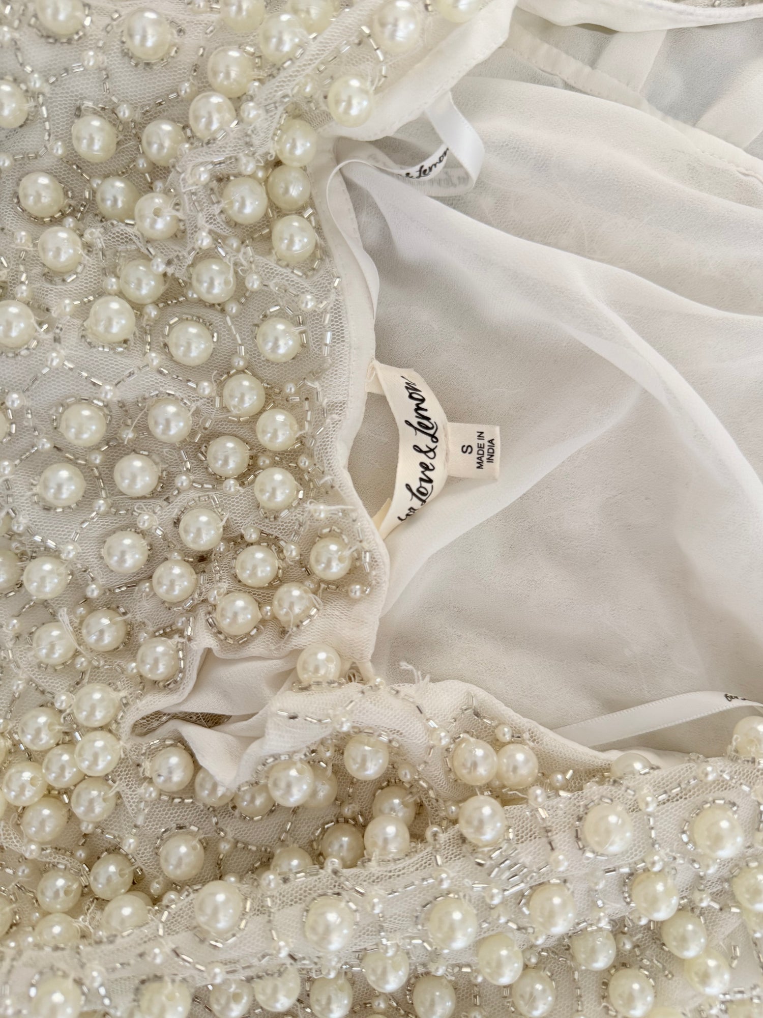 Pearly bow halter top white