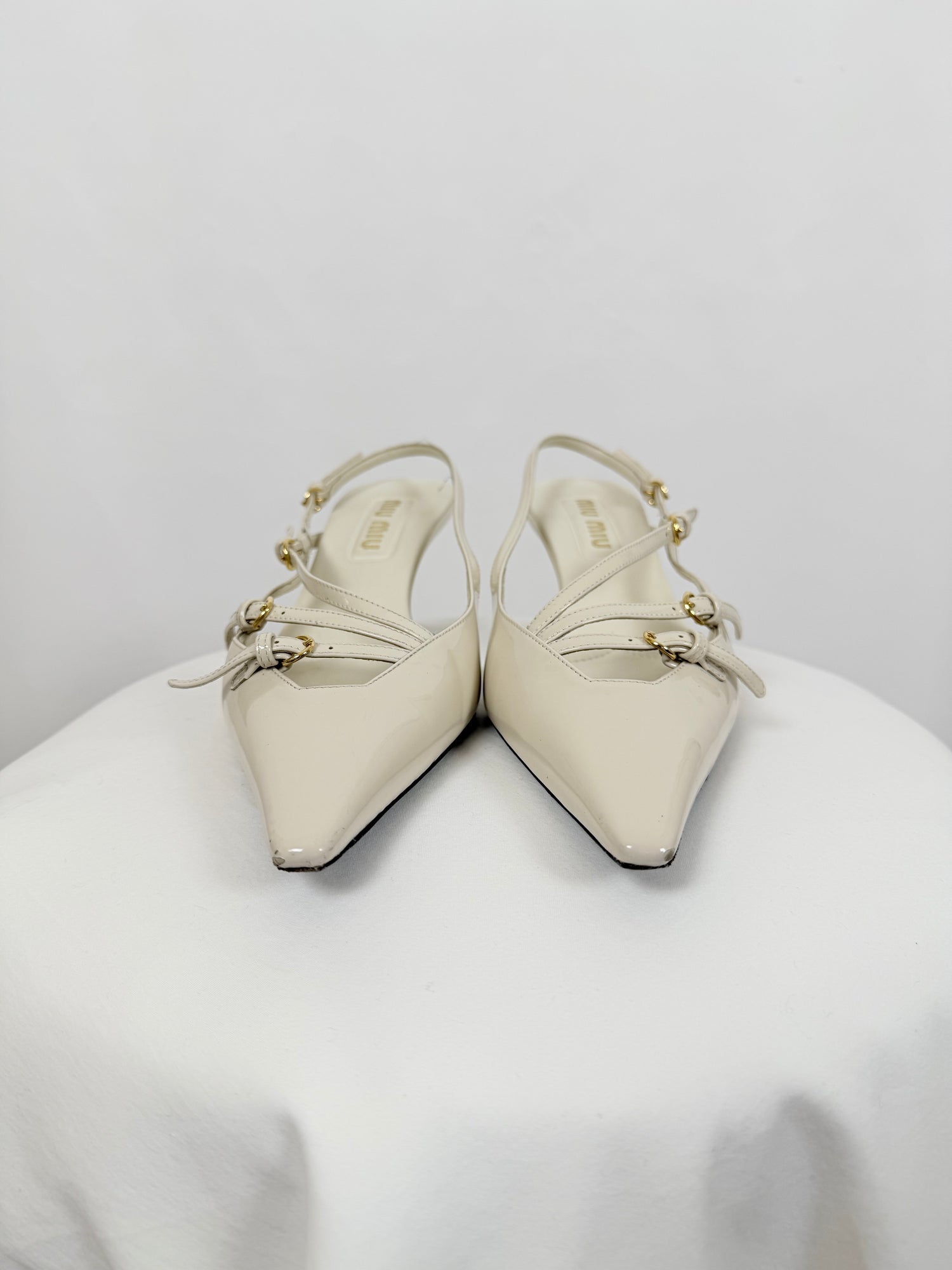 Slingback pointed-toe pumps