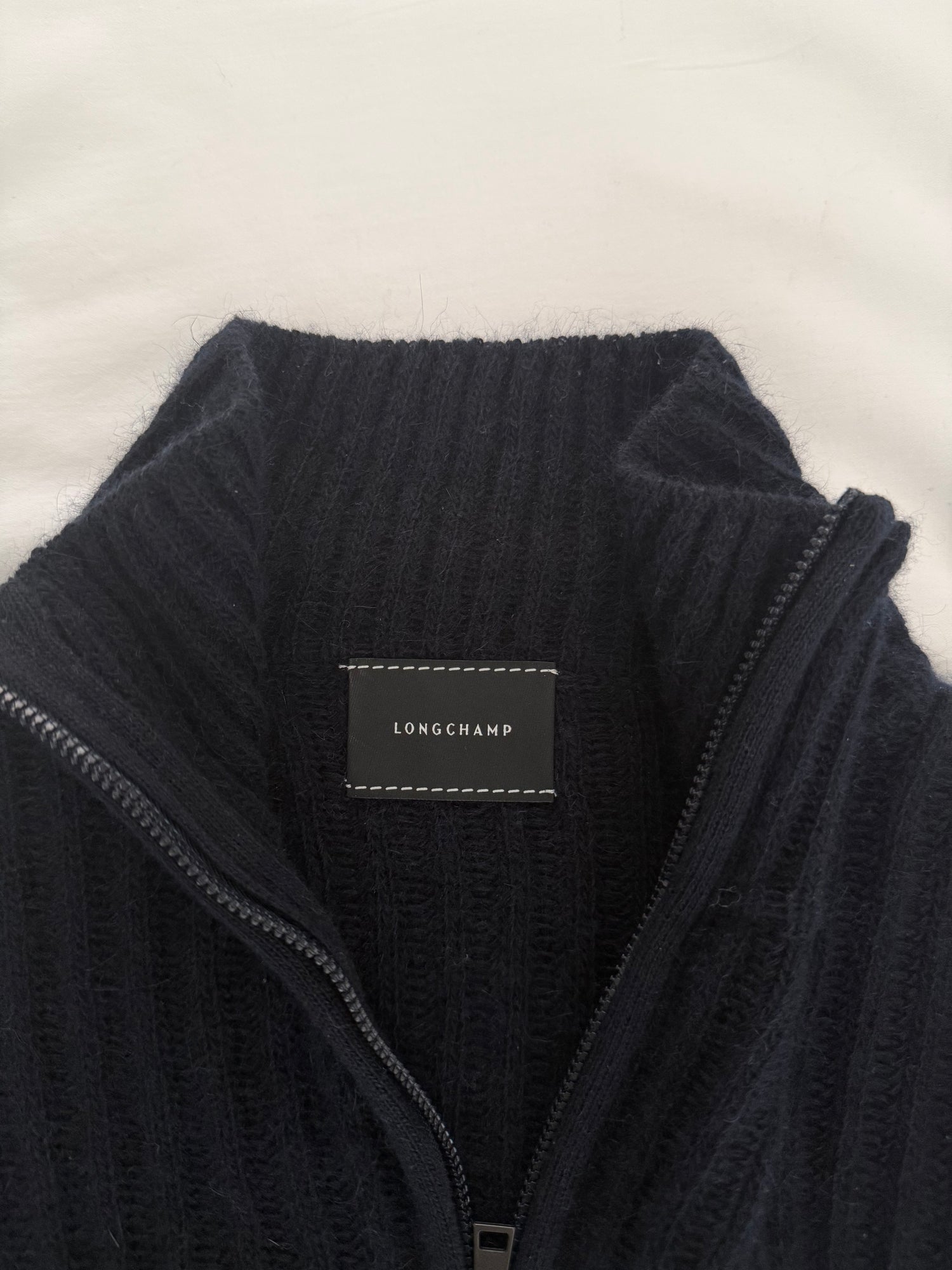 Cardigan court à col zippé bleu marine