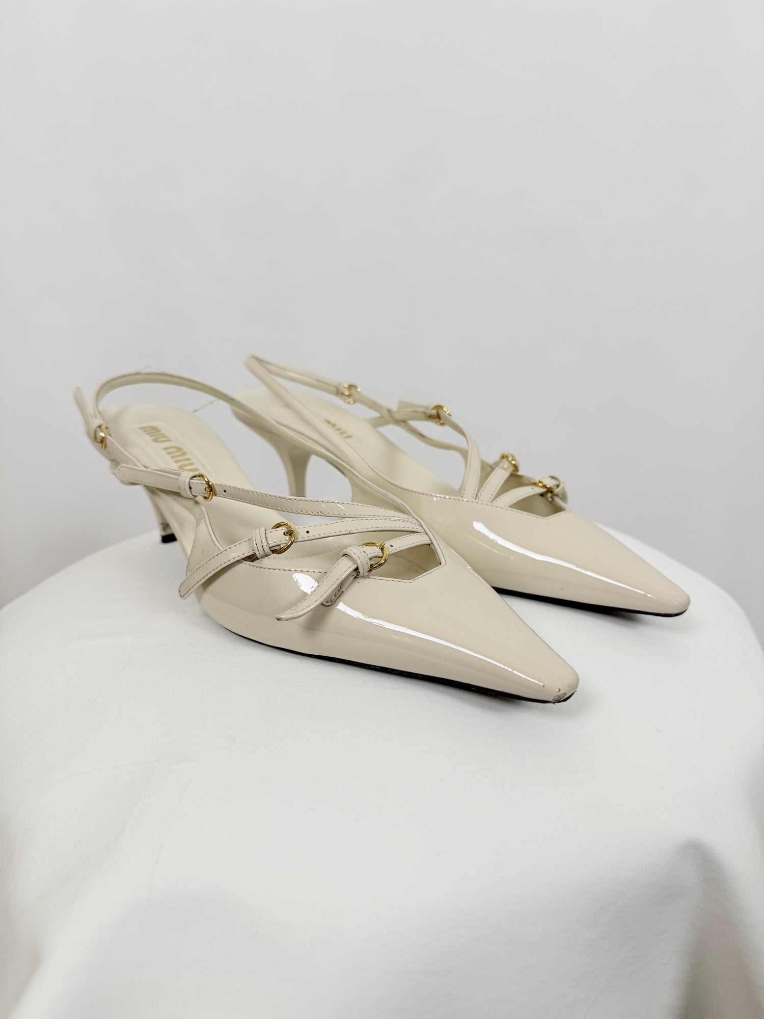 Slingback pointed-toe pumps
