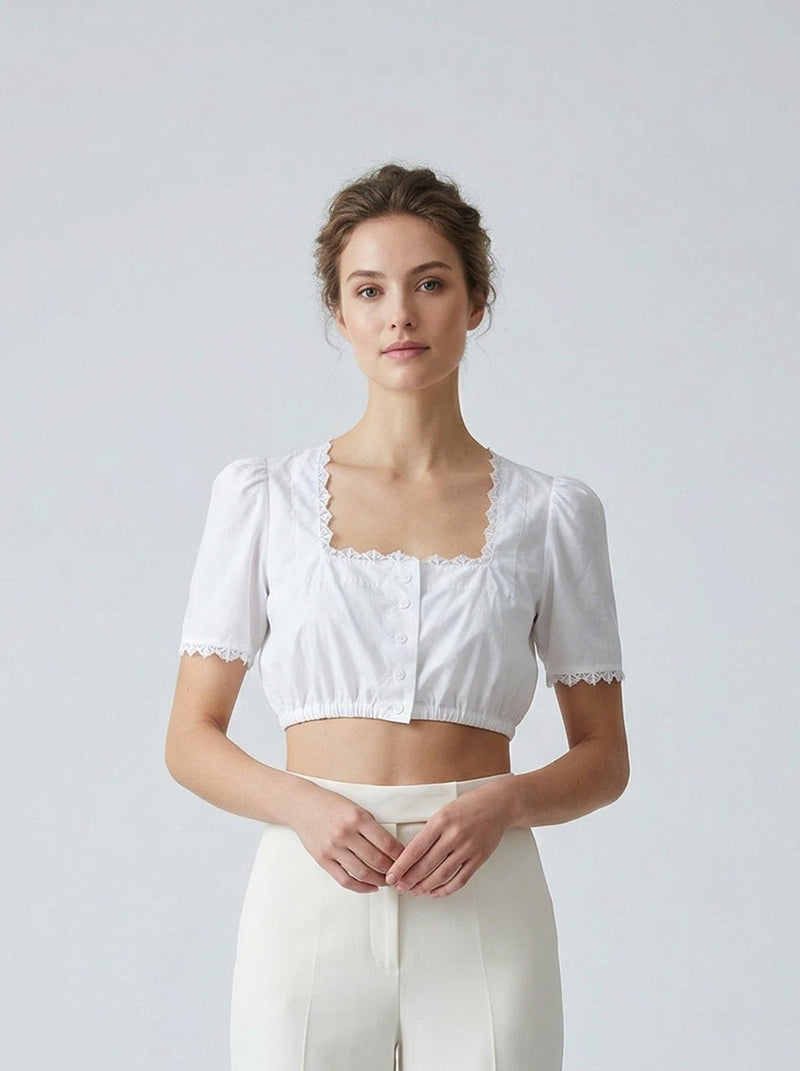 Blouse blanche courte à manches bouffantes